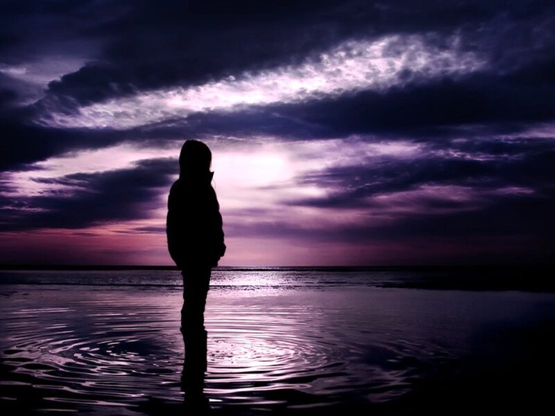 Silhouette at the water's edge