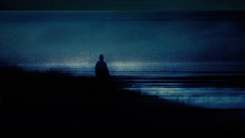 silhouette at the water's edge