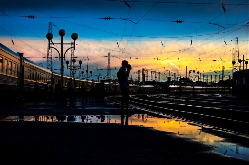 Silhouette at Train Station — Blue