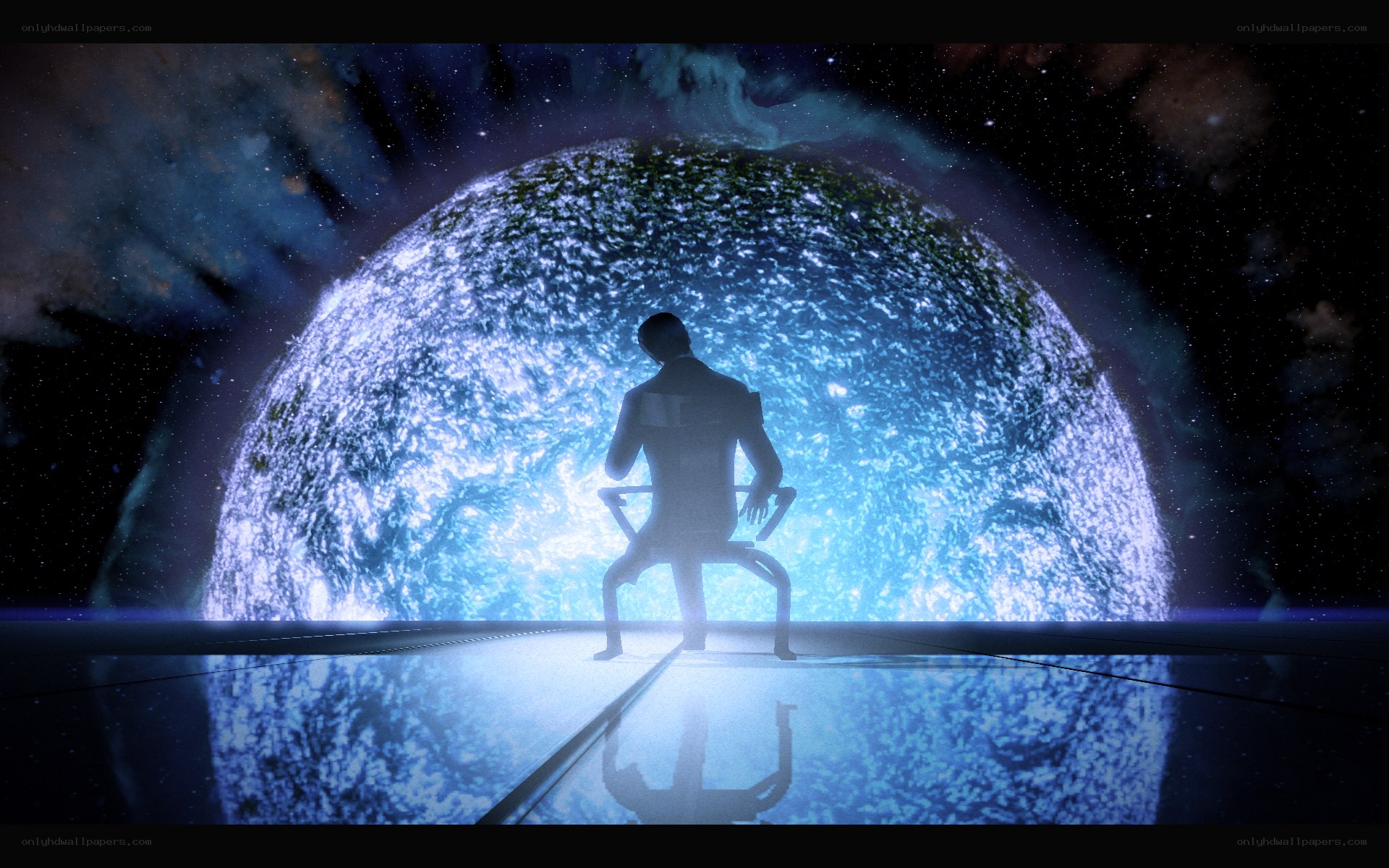 silhouette before glowing planet