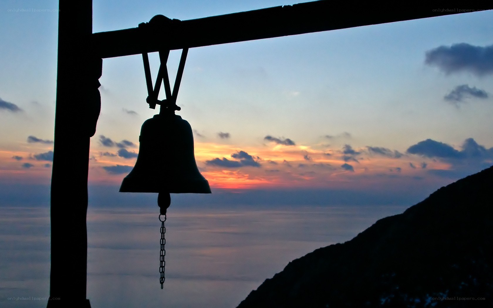 Silhouette bell at sunset