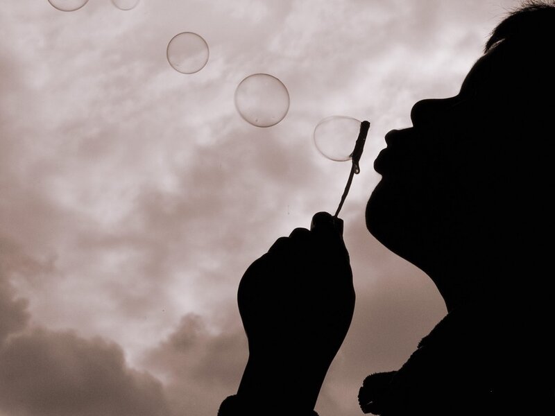 Silhouette Blowing Bubbles — Black