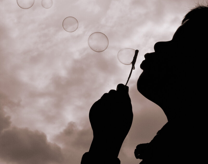 Silhouette Blowing Bubbles