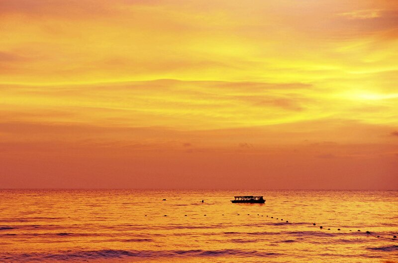 Silhouette Boat on Ocean