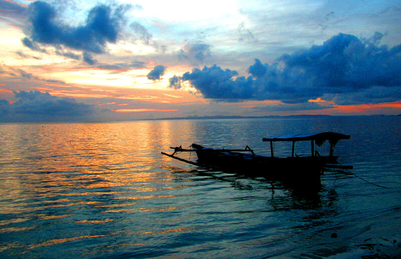 Silhouette Boat on Water — Blue