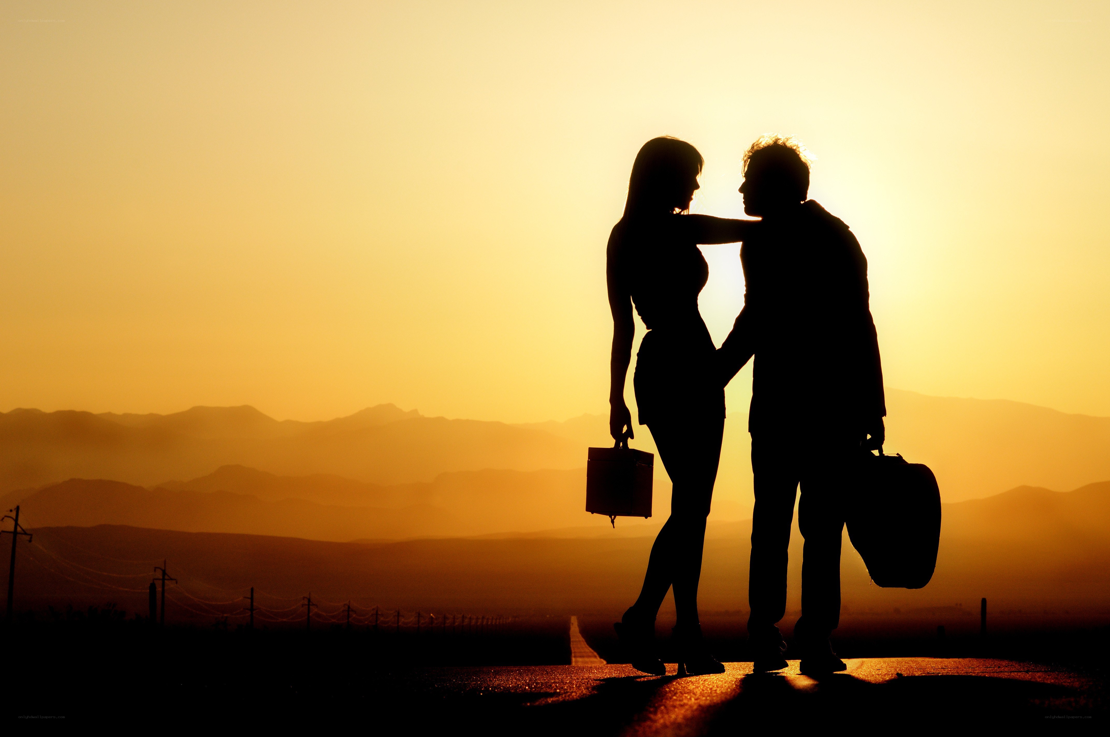 silhouette couple at sunset