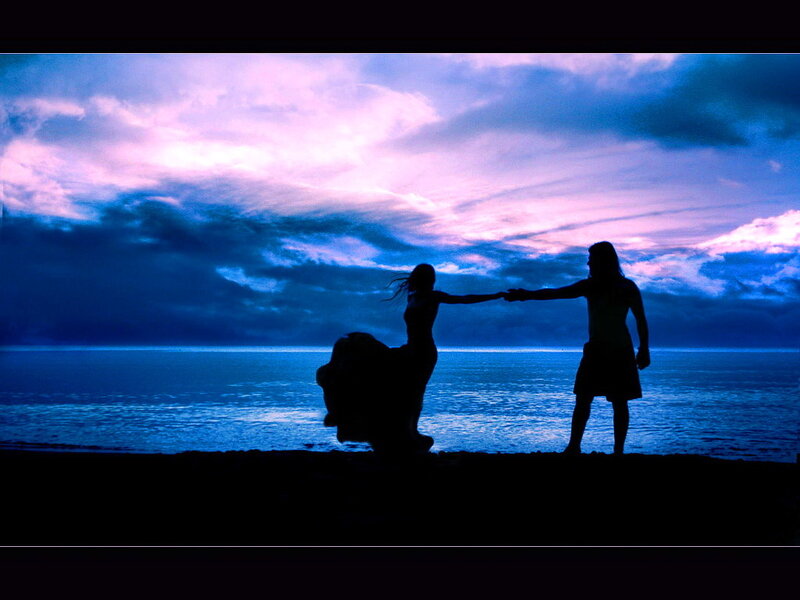 Silhouette Couple on Beach