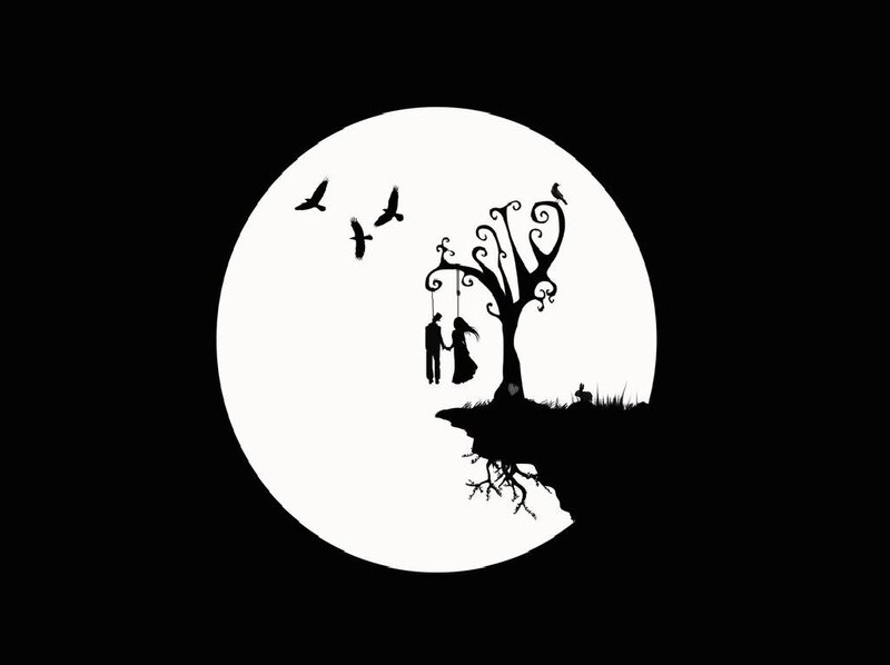 Silhouette Couple on Swing