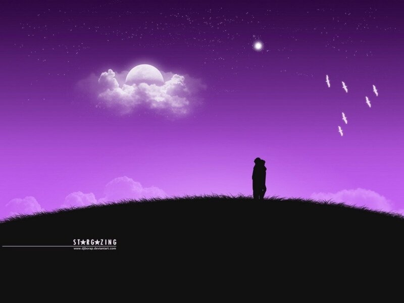 Silhouette couple stargazing