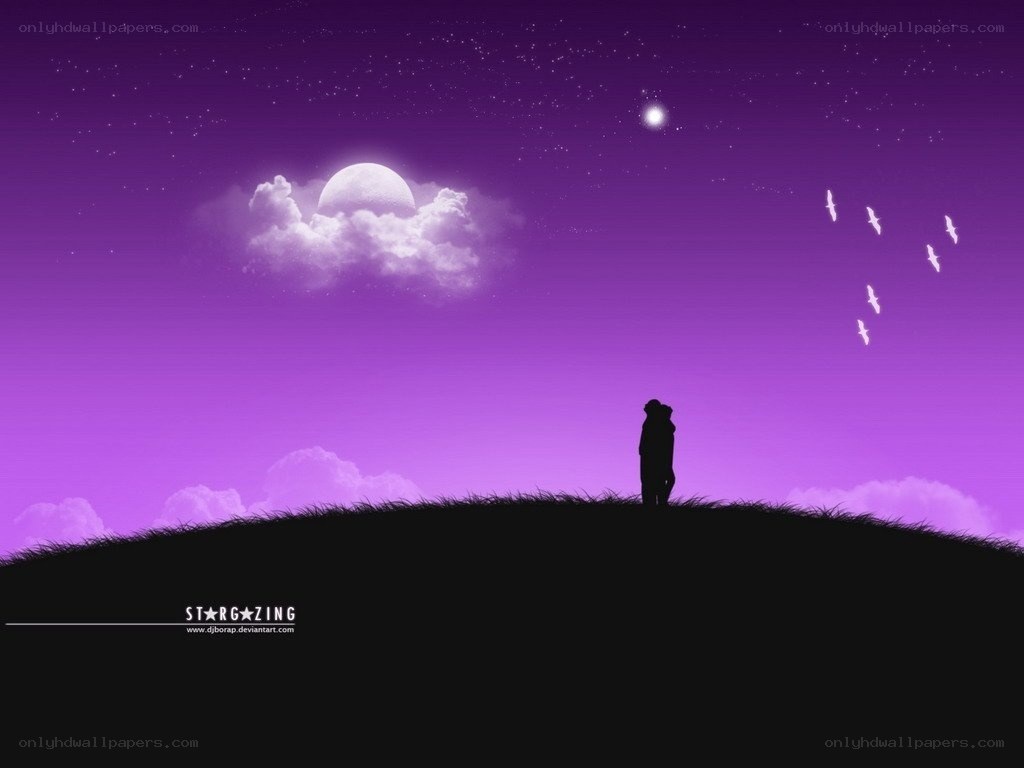 Silhouette couple stargazing