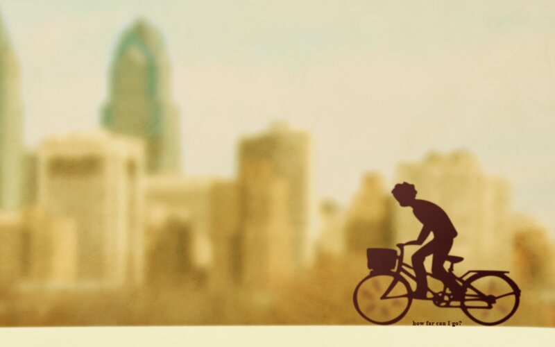 silhouette cyclist in city