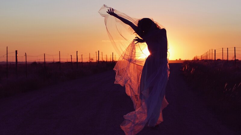 Silhouette dancer at sunset