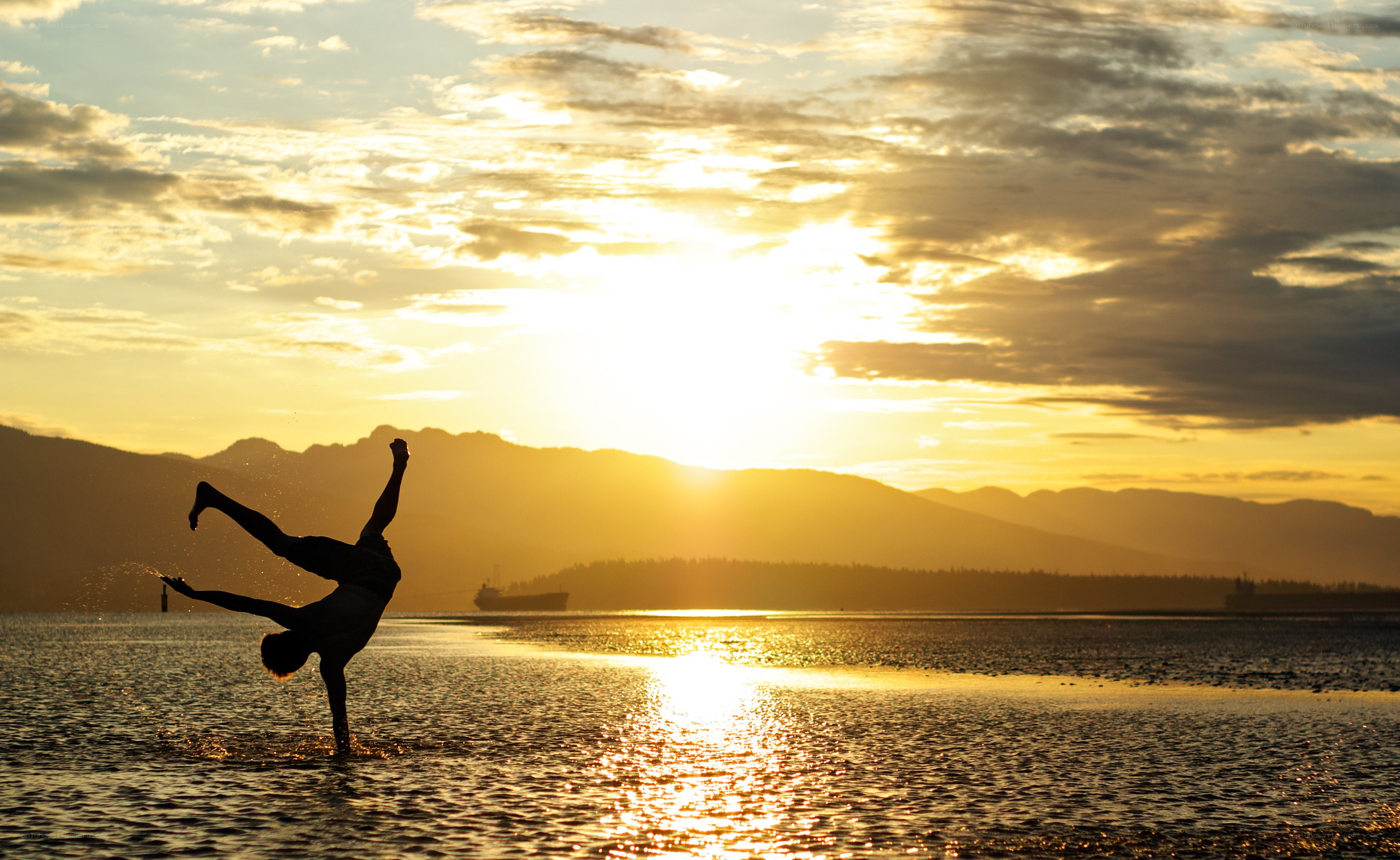 Silhouette dancer at sunset