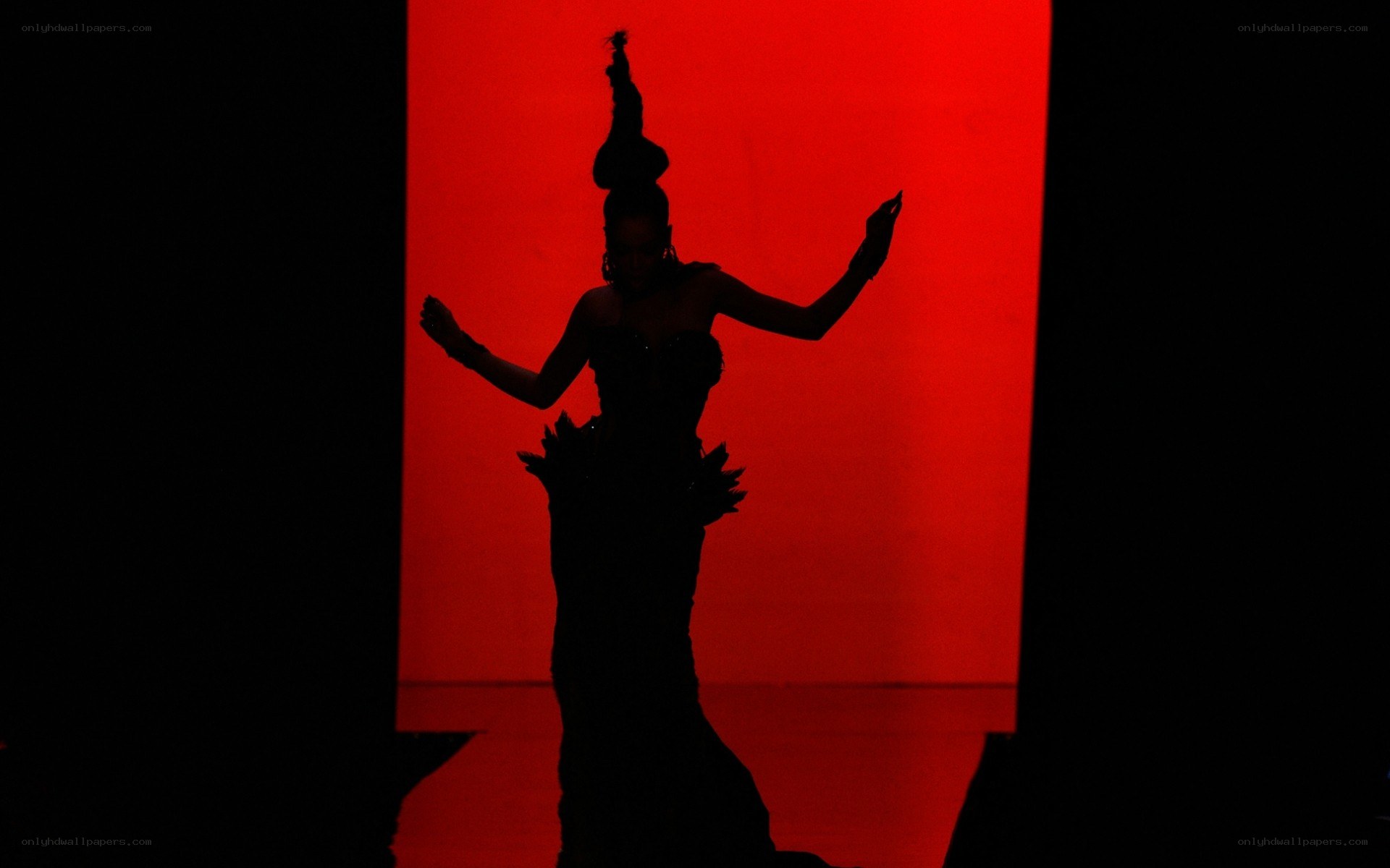 silhouette dancer on red stage