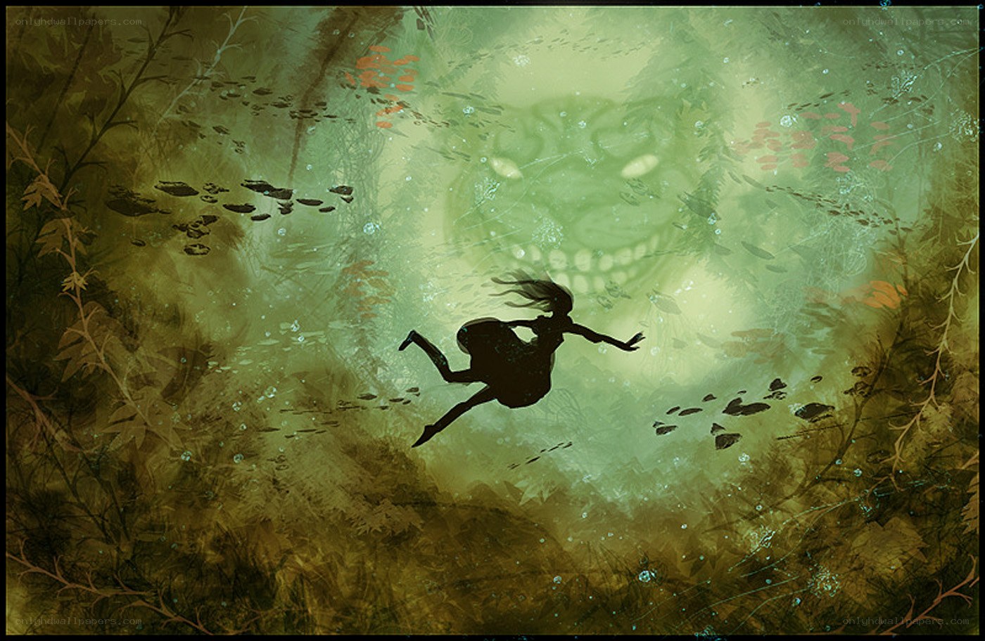 Silhouette diving into green water