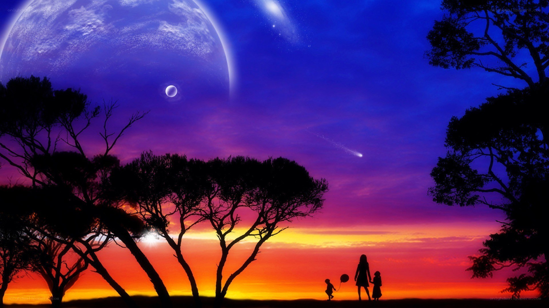 Silhouette family under alien sky