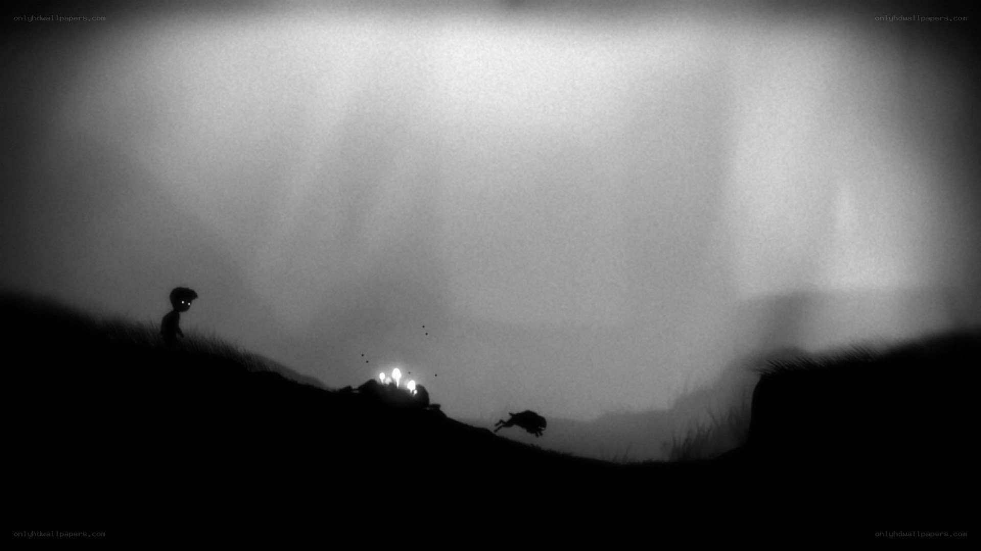 Silhouette figures on a hill