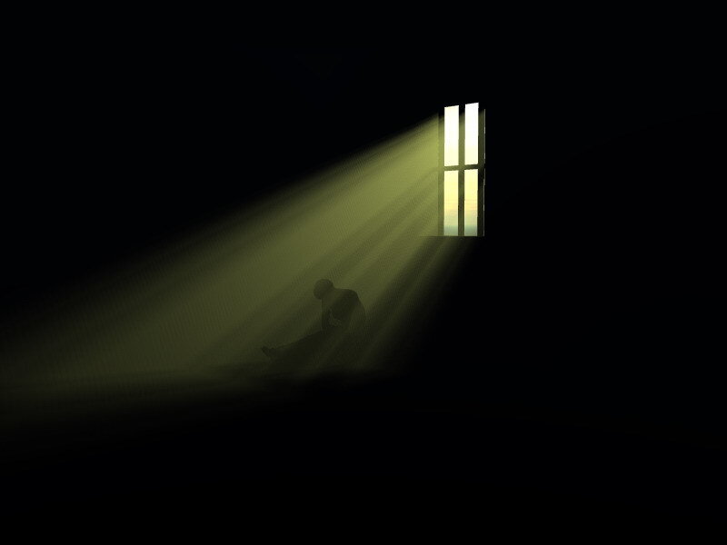 silhouette in a beam of light
