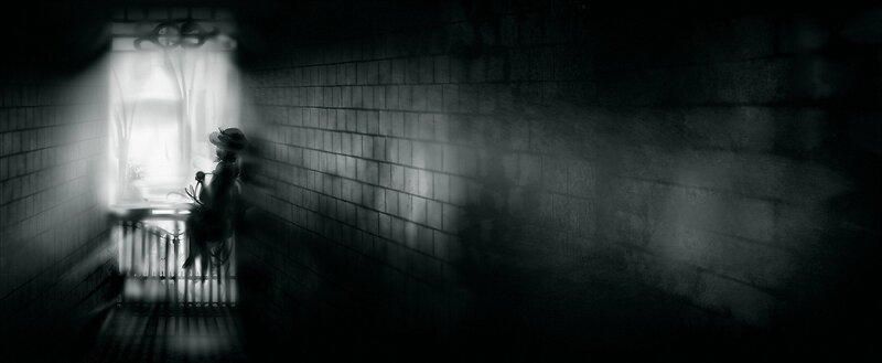 silhouette in a dark corridor