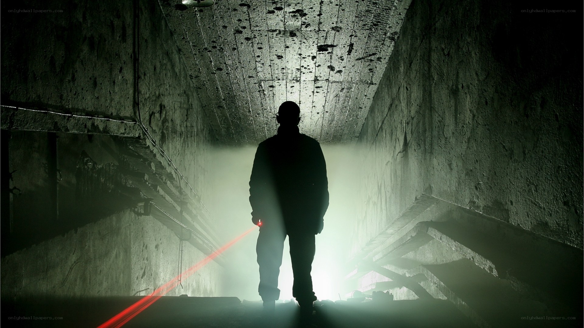 Silhouette in a dark tunnel