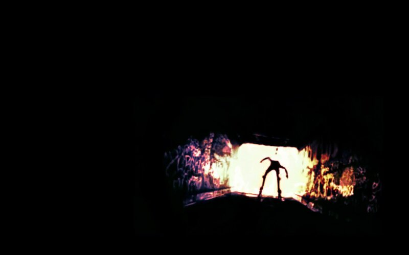 silhouette in a fiery tunnel