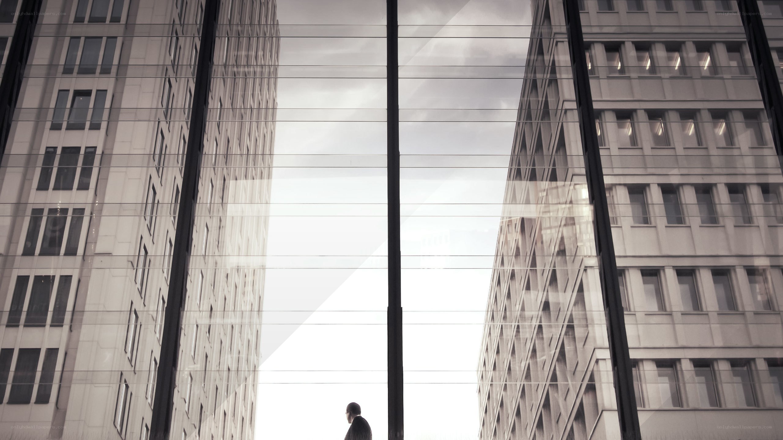 Silhouette in a glass corridor