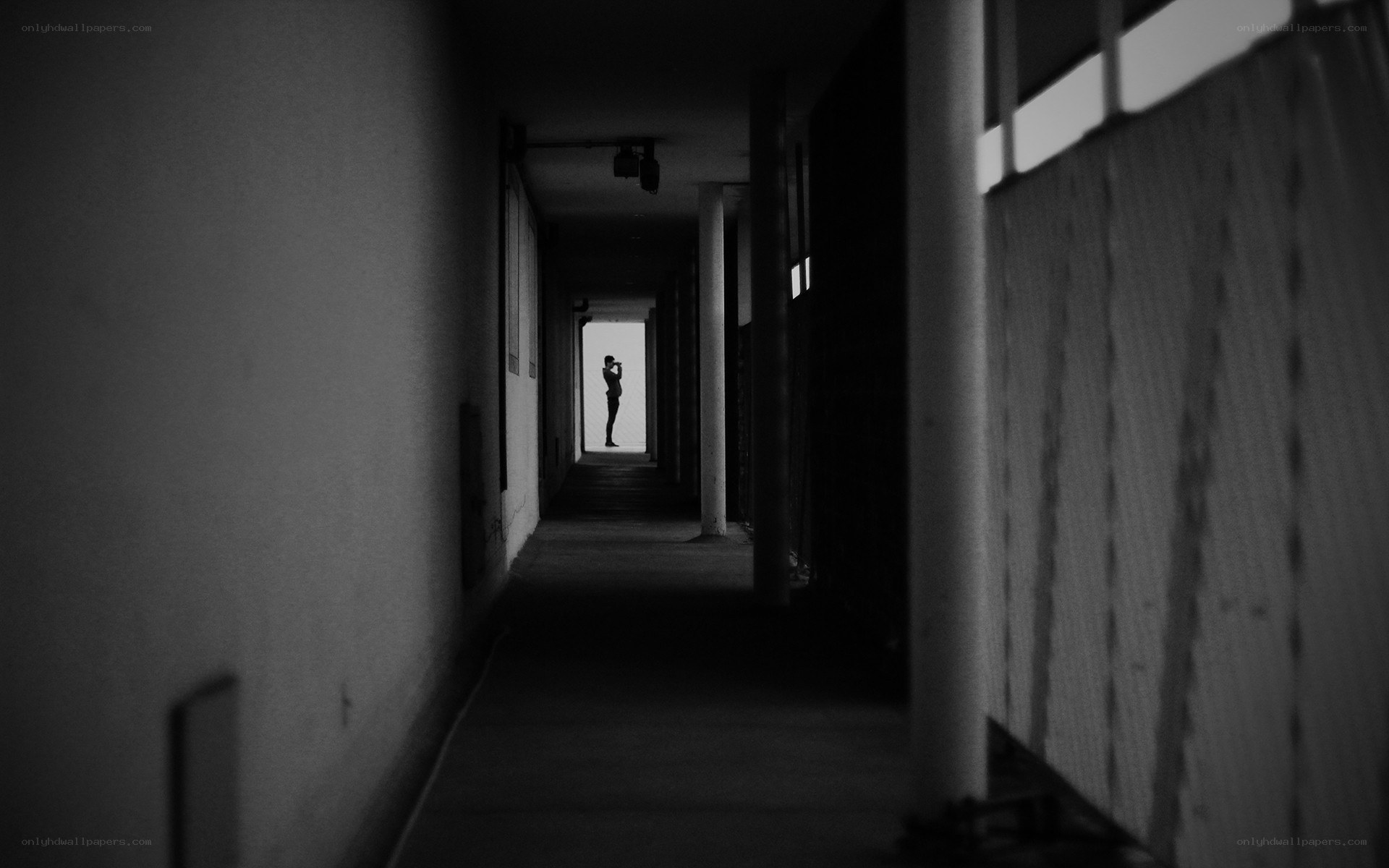 Silhouette in a long corridor