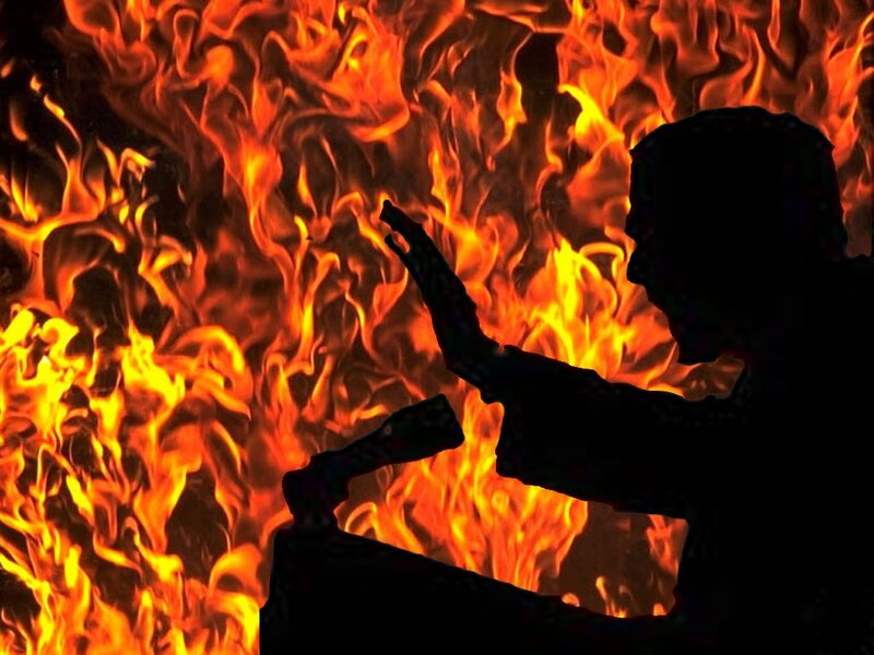 silhouette in fire