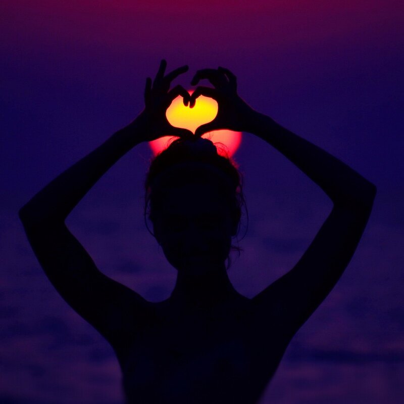 Silhouette Making Heart Shape — Purple