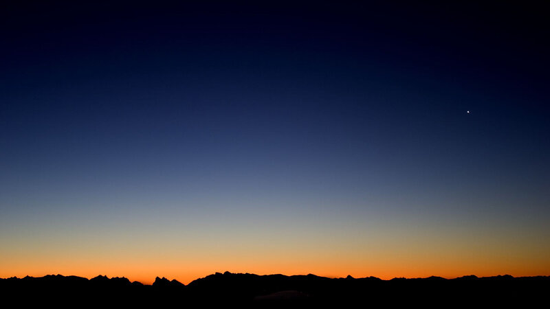 silhouette mountains at dusk