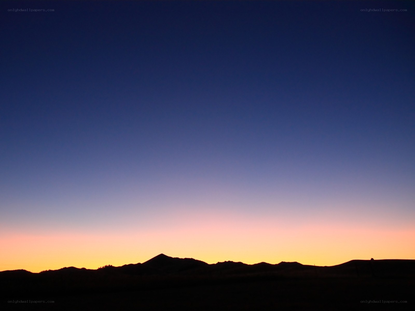 silhouette mountains at sunset