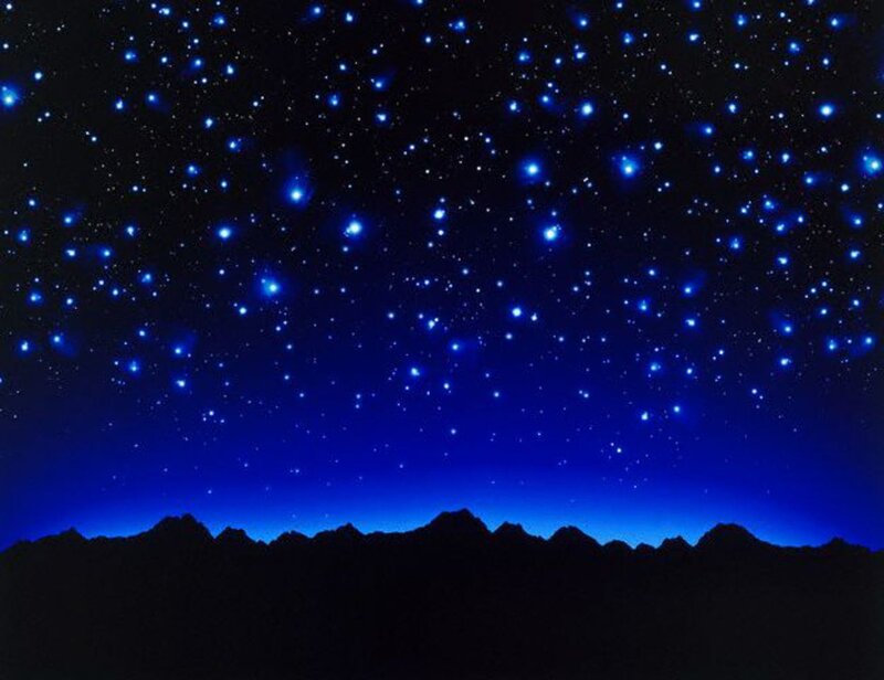 Silhouette Mountains under Stars