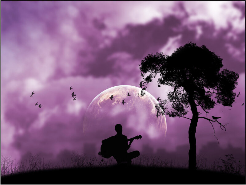 Silhouette musician under purple moon