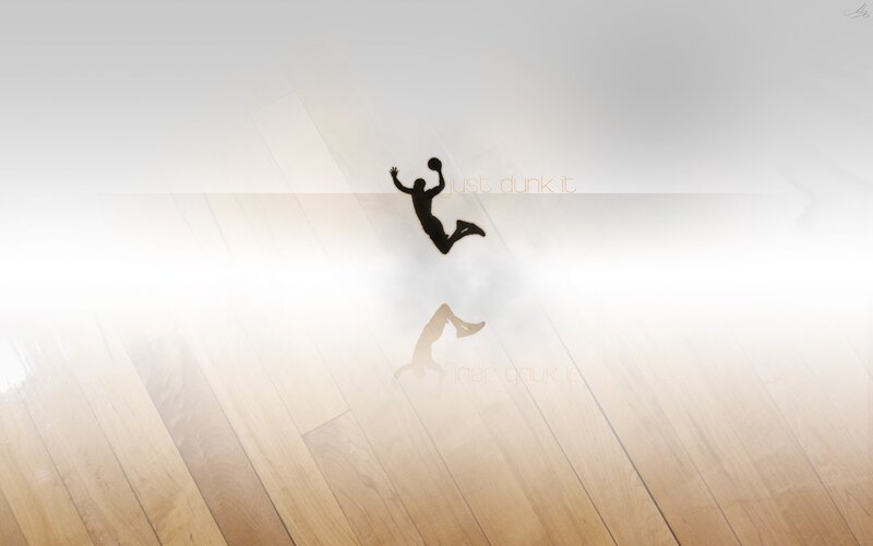 silhouette of a basketball player dunking