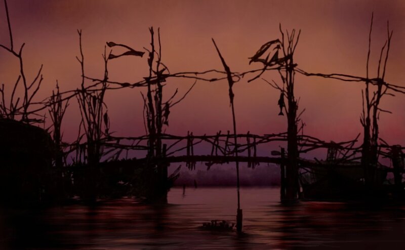 silhouette of a bridge at dusk