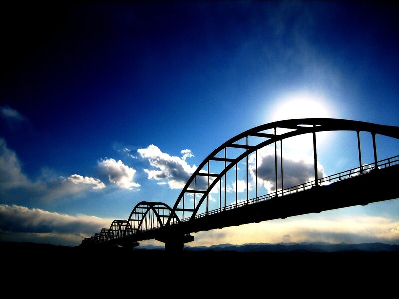 Silhouette of a bridge at sunset