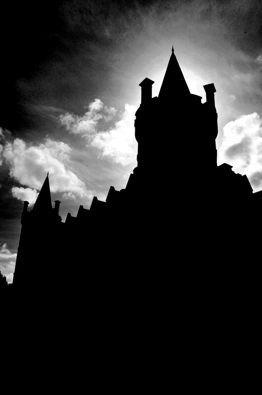 Silhouette of a castle at dusk