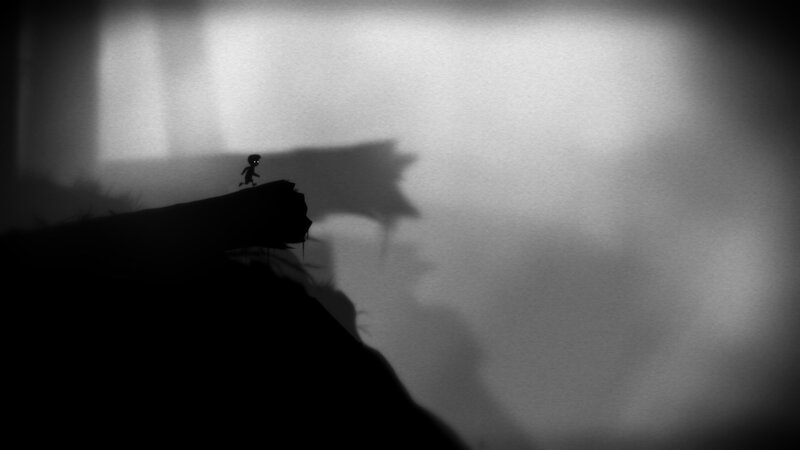Silhouette of a child on a cliff