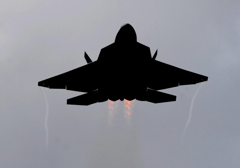Silhouette of a fighter jet