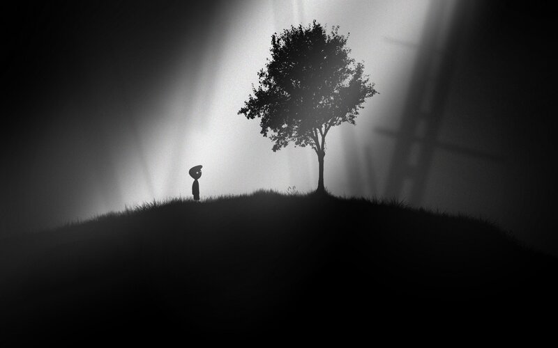 Silhouette of a figure and tree