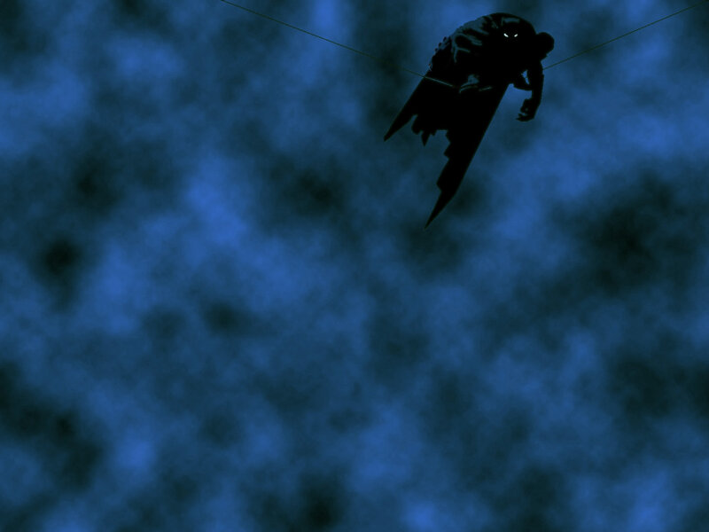 Silhouette of a figure on a wire