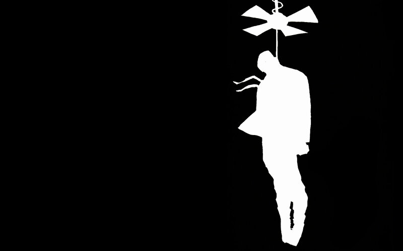 silhouette of a hanging figure