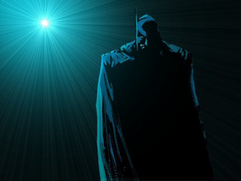 silhouette of a hero in blue light