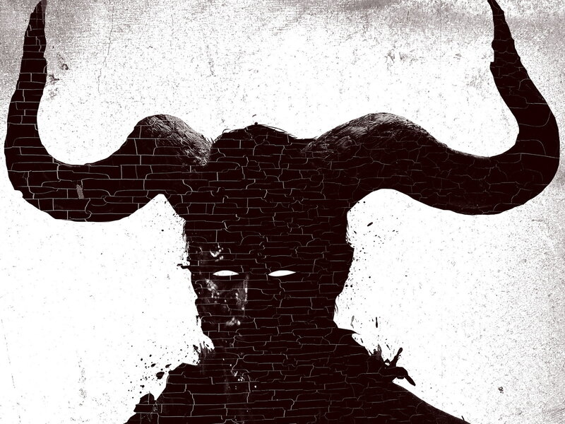 silhouette of a horned figure