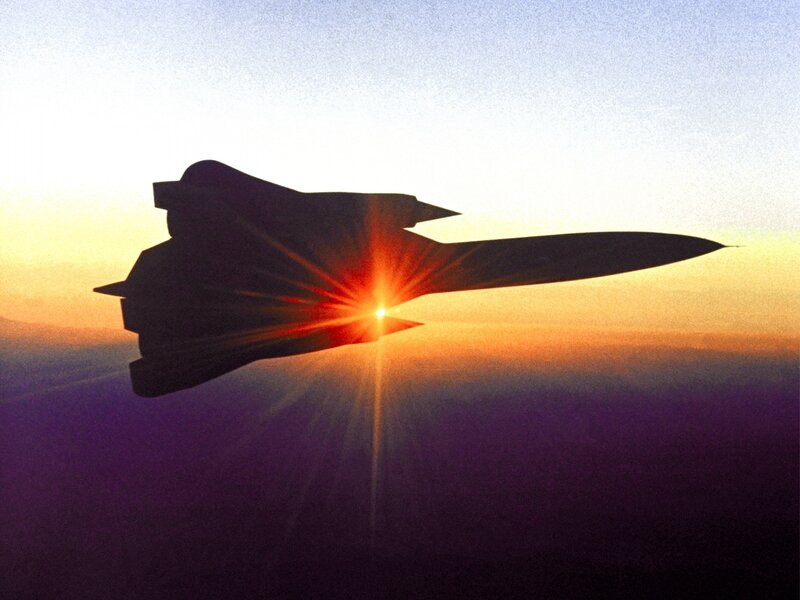 Silhouette of a jet at sunset