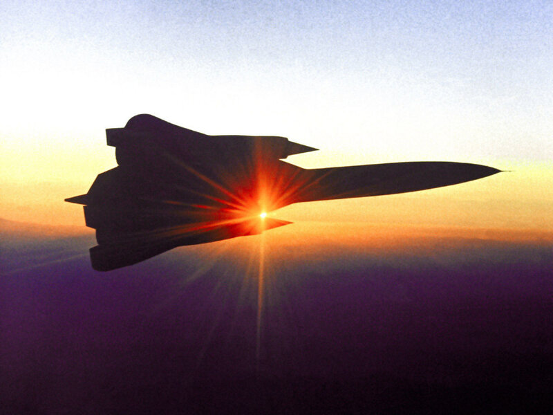 Silhouette of a jet at sunset