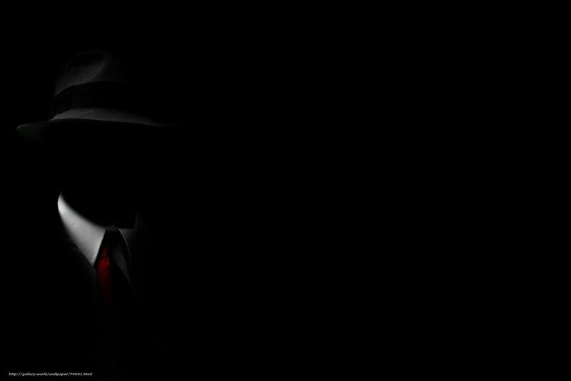 Silhouette of a man in a hat