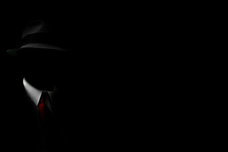 silhouette of a man in hat