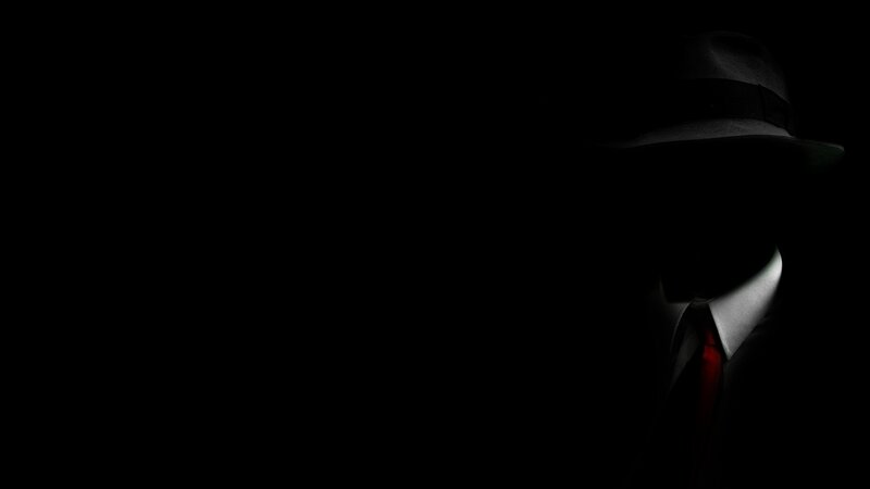 silhouette of a man in hat