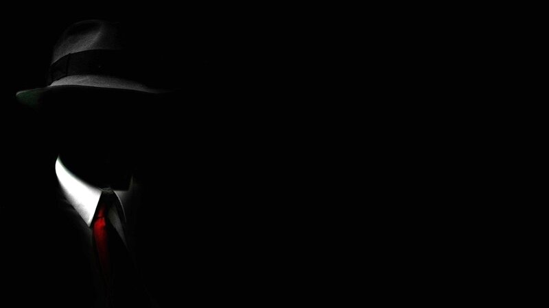 silhouette of a man in hat